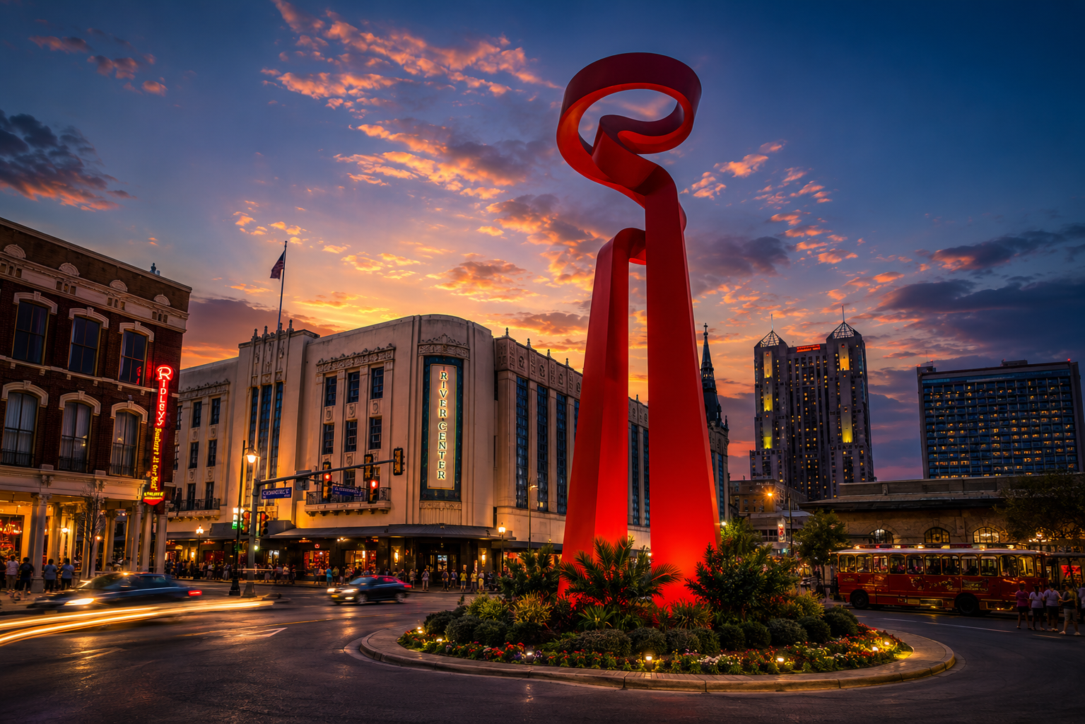 Torch of Friendship sculpture at Rivercenter at blue hour